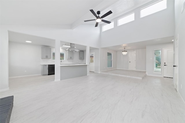 7211 Autumn Grove Dr, Houston, TX 77072 - unfurnished living room with ceiling fan, high vaulted ceiling, and baseboards
