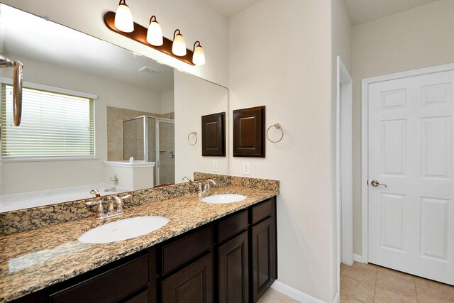 7714 Guldan Dr, Richmond, TX 77407 - full bathroom featuring a stall shower, double vanity, tile patterned flooring, and a bath