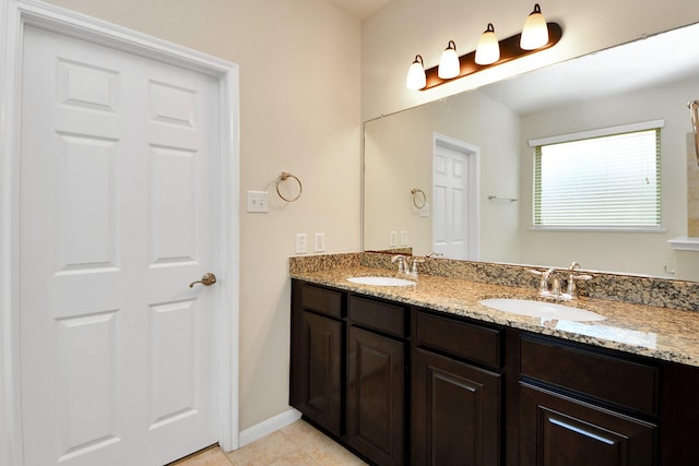 7714 Guldan Dr, Richmond, TX 77407 - full bath with double vanity and tile patterned floors