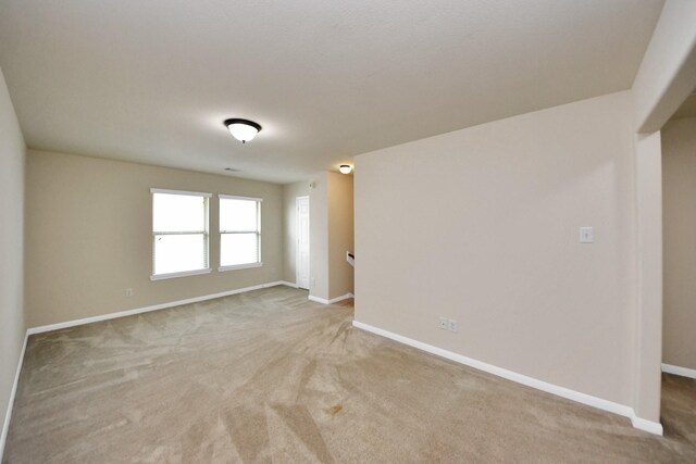 7714 Guldan Dr, Richmond, TX 77407 - unfurnished room with light carpet and baseboards