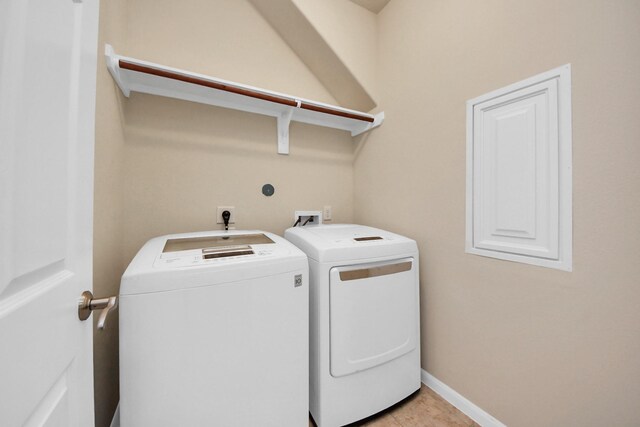 7714 Guldan Dr, Richmond, TX 77407 - washroom featuring independent washer and dryer and baseboards