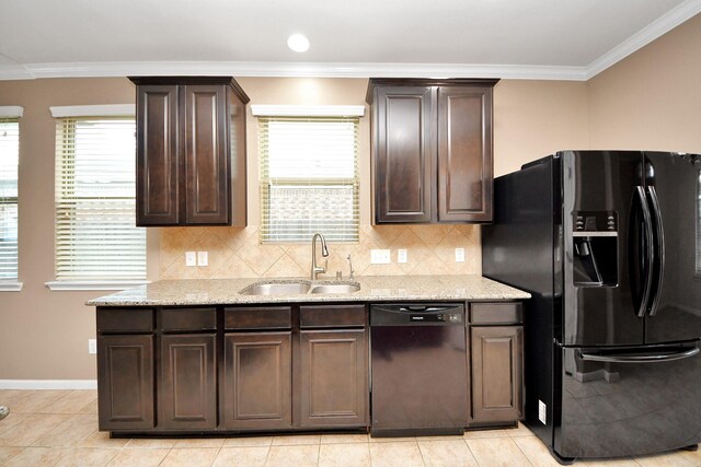 7714 Guldan Dr, Richmond, TX 77407 - kitchen featuring black appliances, a sink, dark brown cabinetry, light stone countertops, and ornamental molding