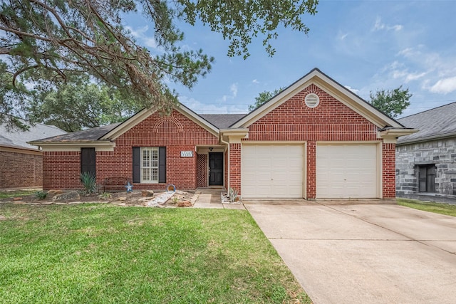 17423 Hamilwood Dr, Houston, TX 77095 - view of front facade featuring a garage, driveway, brick siding, and a front lawn