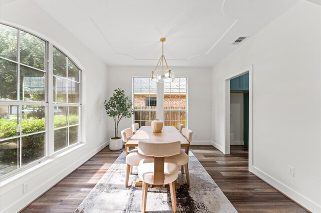 31318 Bearing Star Ln, Tomball, TX 77375 - dining space with a chandelier, baseboards, and dark wood-style flooring