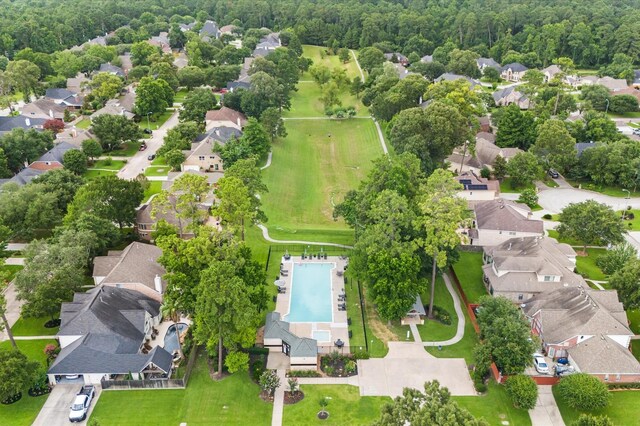 31318 Bearing Star Ln, Tomball, TX 77375 - aerial view of residential area featuring a pool area