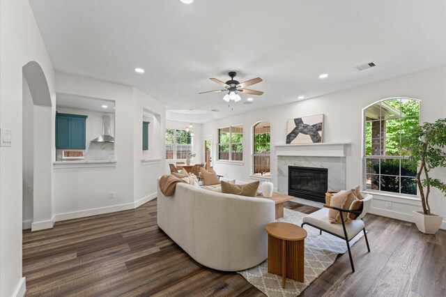 31318 Bearing Star Ln, Tomball, TX 77375 - living room featuring plenty of natural light, ceiling fan, a fireplace, dark wood-style flooring, and recessed lighting
