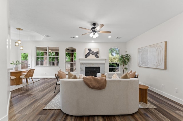 31318 Bearing Star Ln, Tomball, TX 77375 - living room with baseboards, plenty of natural light, a fireplace, and recessed lighting
