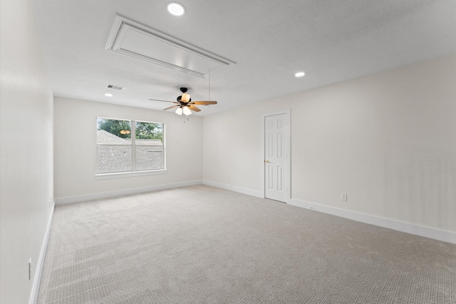 31318 Bearing Star Ln, Tomball, TX 77375 - spare room with attic access, carpet flooring, recessed lighting, and baseboards