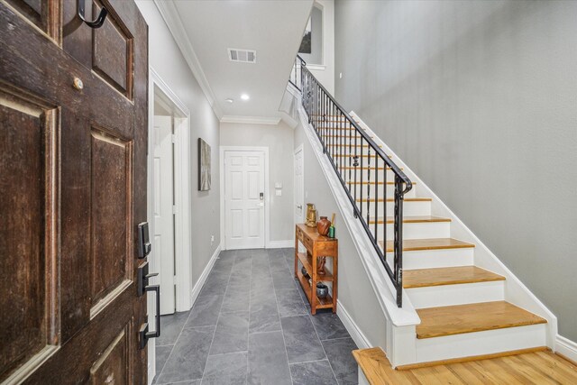 1814 Rosalie St, Houston, TX 77004 - foyer entrance with crown molding, stairs, and recessed lighting
