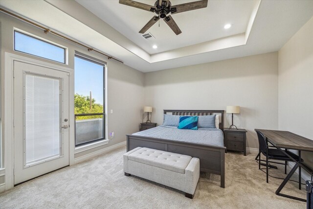1814 Rosalie St, Houston, TX 77004 - bedroom with light colored carpet, access to exterior, recessed lighting, ceiling fan, and a raised ceiling