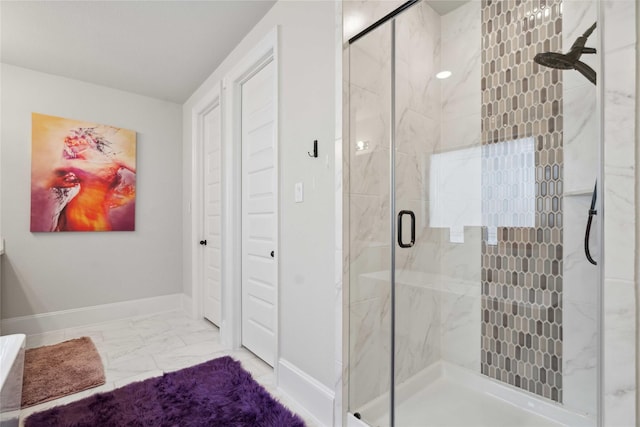 17464 Chestnut Cove Dr, Conroe, TX 77302 - bathroom featuring a marble finish shower, marble finish flooring, and baseboards
