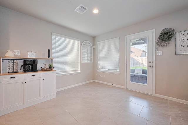 3415 Sicily Island Ln, Katy, TX 77494 - unfurnished dining area featuring healthy amount of natural light, light tile patterned floors, baseboards, and recessed lighting