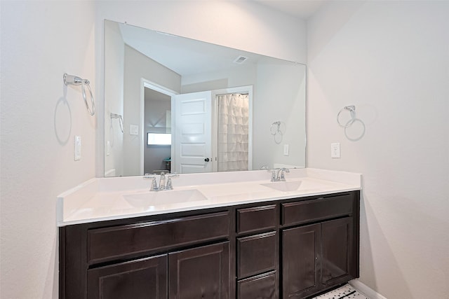 3415 Sicily Island Ln, Katy, TX 77494 - full bathroom with double vanity and baseboards