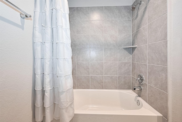 3415 Sicily Island Ln, Katy, TX 77494 - full bathroom featuring shower / bath combo and a textured wall