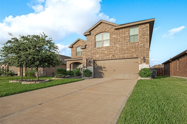 3415 Sicily Island Ln, Katy, TX 77494 - view of front of home featuring brick siding, an attached garage, driveway, and cooling unit