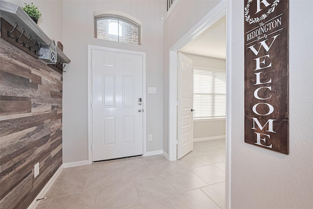 3415 Sicily Island Ln, Katy, TX 77494 - foyer featuring plenty of natural light, light tile patterned flooring, baseboards, and a high ceiling