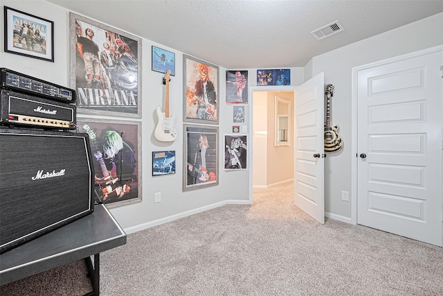 3415 Sicily Island Ln, Katy, TX 77494 - playroom featuring carpet floors, a textured ceiling, and baseboards