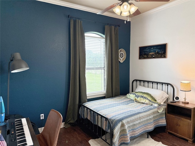 1549 Frontier Trl, Angleton, TX 77515 - bedroom featuring crown molding, wood finished floors, baseboards, and ceiling fan