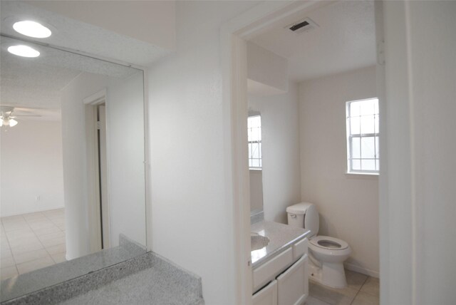 6207 Grandvale Dr, Houston, TX 77072 - bathroom with vanity, a ceiling fan, and tile patterned floors