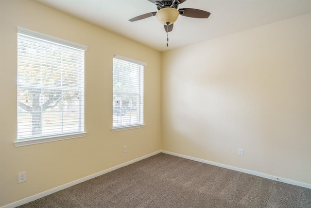 4704 High Creek Ct, Alvin, TX 77511 - carpeted spare room with healthy amount of natural light, ceiling fan, and baseboards