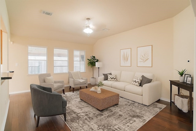 4704 High Creek Ct, Alvin, TX 77511 - living room featuring dark wood-style flooring, baseboards, and lofted ceiling