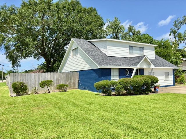 5301 Hemlock Dr, Baytown, TX 77521 - view of property exterior with roof with shingles and brick siding