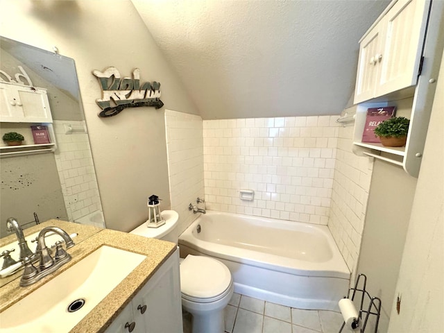 5301 Hemlock Dr, Baytown, TX 77521 - bathroom with a tub, vaulted ceiling, toilet, vanity, and tile patterned flooring