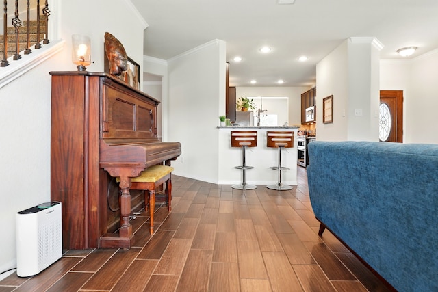 3519 Barkers Run Dr, Houston, TX 77084 - interior space with dark wood finished floors, crown molding, stairway, and recessed lighting