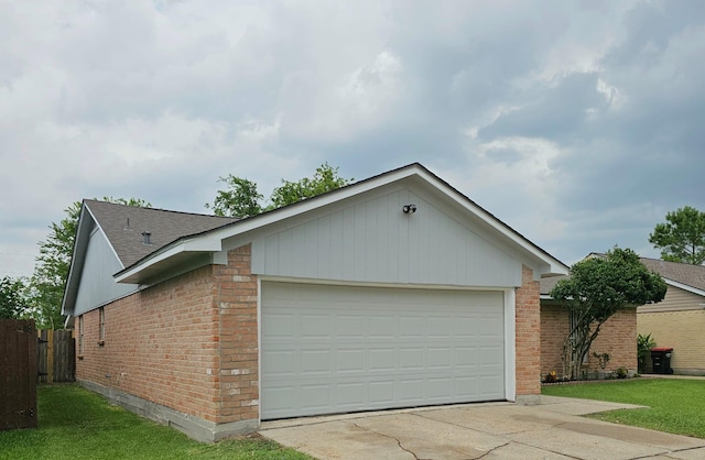 2806 W Greens Rd, Houston, TX 77067 - view of front facade with brick siding, driveway, a garage, and roof with shingles