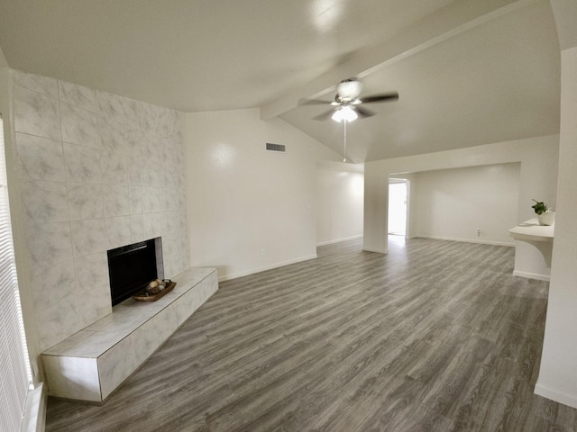 2806 W Greens Rd, Houston, TX 77067 - unfurnished living room with ceiling fan, wood finished floors, baseboards, and a tile fireplace