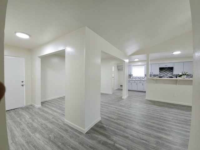 2806 W Greens Rd, Houston, TX 77067 - below grade area with wood finished floors, baseboards, and recessed lighting