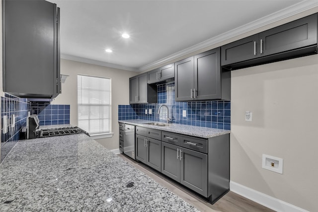 12127 Redfern Dr, Houston, TX 77048 - kitchen with a sink, stainless steel dishwasher, light stone counters, backsplash, and range with gas cooktop