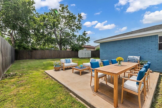 12127 Redfern Dr, Houston, TX 77048 - view of patio with an outdoor hangout area and a grill