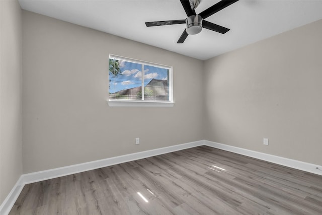 12127 Redfern Dr, Houston, TX 77048 - unfurnished room with wood finished floors, baseboards, and ceiling fan