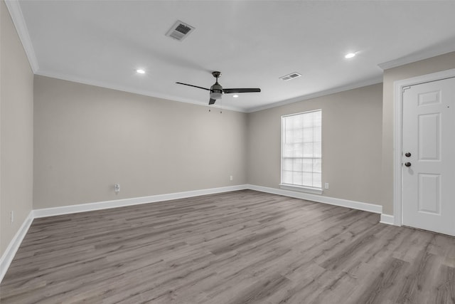 12127 Redfern Dr, Houston, TX 77048 - unfurnished room featuring crown molding, baseboards, wood finished floors, a ceiling fan, and recessed lighting