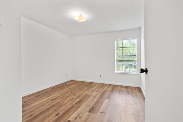 6500 Sands Point Dr Unit 107, Houston, TX 77074 - empty room with hardwood / wood-style floors and baseboards