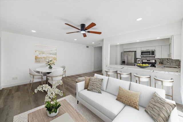 5542 Holly St Unit 205, Houston, TX 77081 - living area with recessed lighting, ceiling fan, and wood finished floors