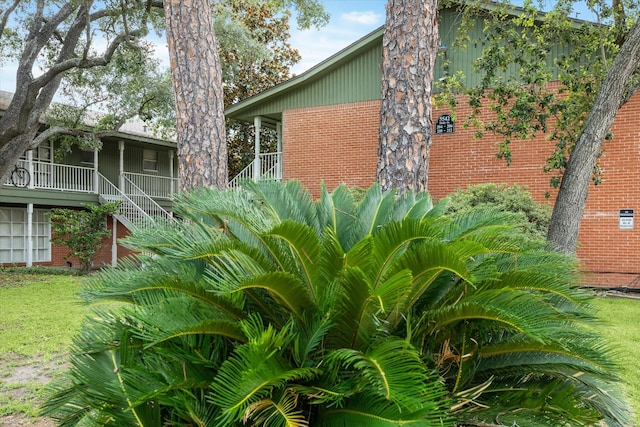 5542 Holly St Unit 205, Houston, TX 77081 - view of home's exterior featuring brick siding