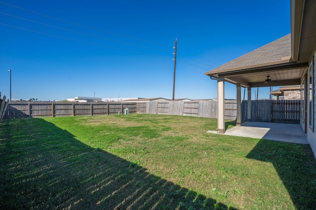 15307 Oakheath Colony Ln, Houston, TX 77044 - fenced backyard with ceiling fan and a patio area