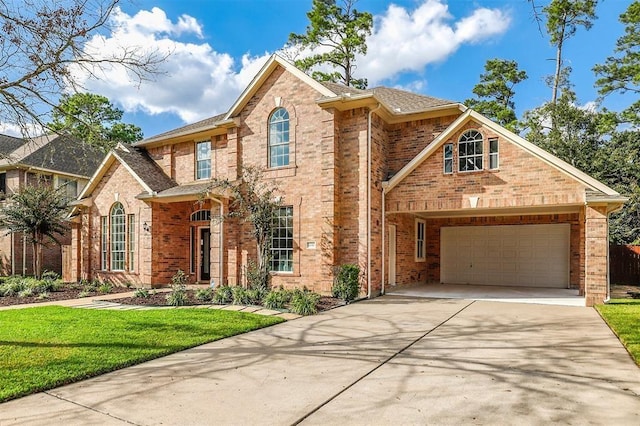 14810 Cantwell Bnd, Cypress, TX 77429 - traditional-style home featuring concrete driveway, brick siding, and a front lawn