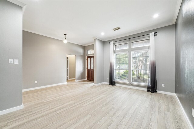 28519 Peper Hollow Ln, Spring, TX 77386 - unfurnished living room with crown molding, light wood finished floors, baseboards, and recessed lighting