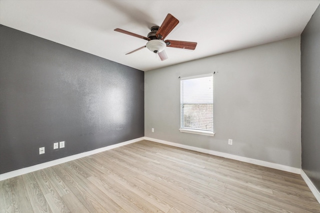 28519 Peper Hollow Ln, Spring, TX 77386 - unfurnished room featuring ceiling fan, wood finished floors, and baseboards