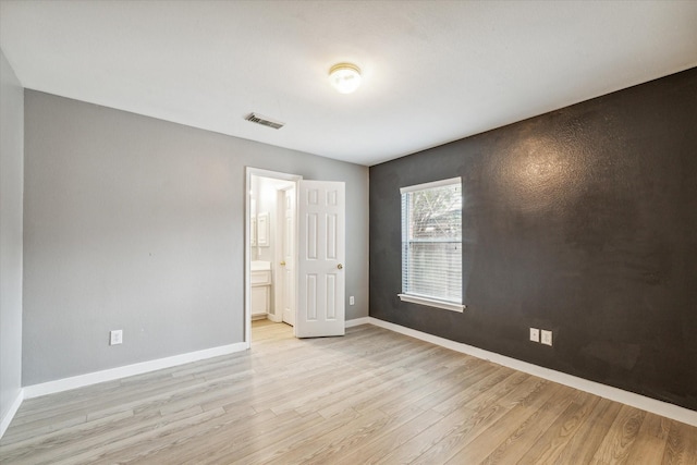 28519 Peper Hollow Ln, Spring, TX 77386 - unfurnished room featuring light wood-style flooring and baseboards