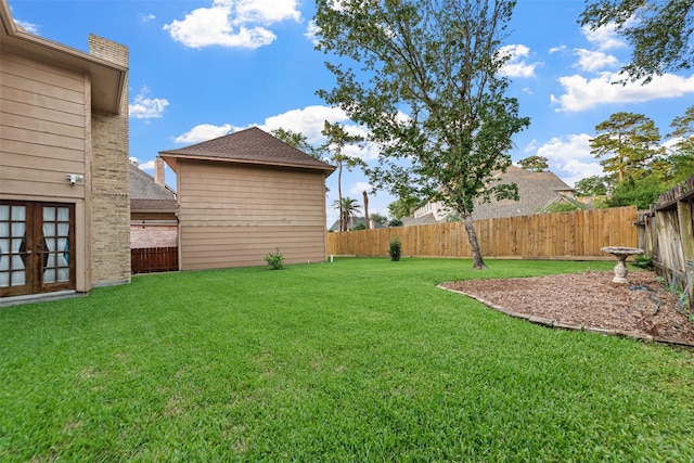 15118 Terrace Oaks Dr, Houston, TX 77068 - fenced backyard with french doors