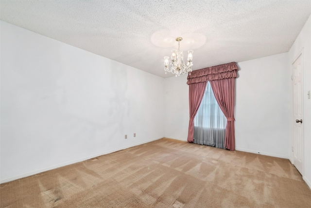 15118 Terrace Oaks Dr, Houston, TX 77068 - spare room with a chandelier, carpet floors, and a textured ceiling