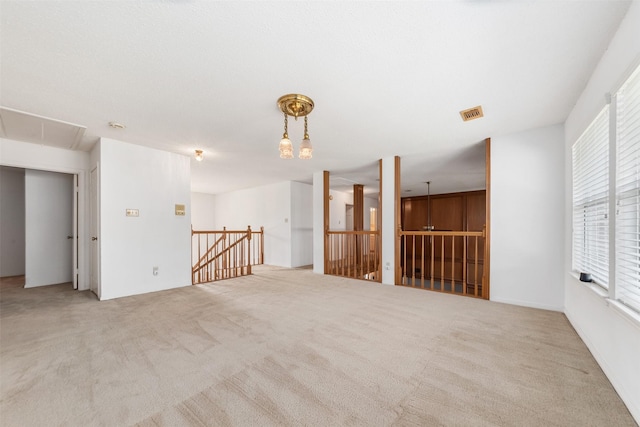 15118 Terrace Oaks Dr, Houston, TX 77068 - carpeted spare room featuring attic access and healthy amount of natural light
