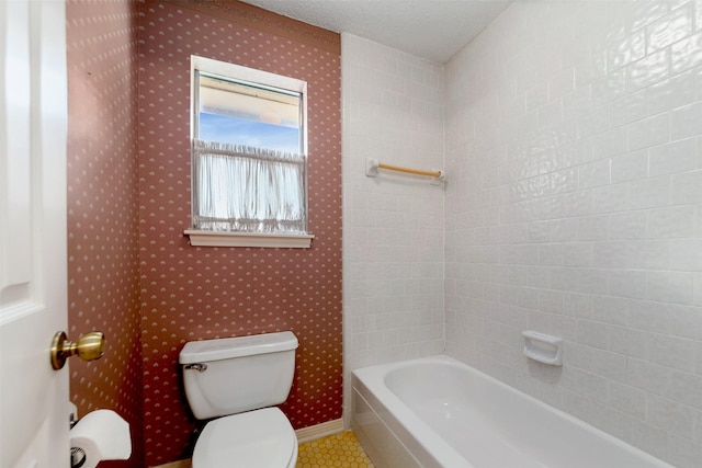15118 Terrace Oaks Dr, Houston, TX 77068 - bathroom featuring a bath, tile patterned floors, and wallpapered walls