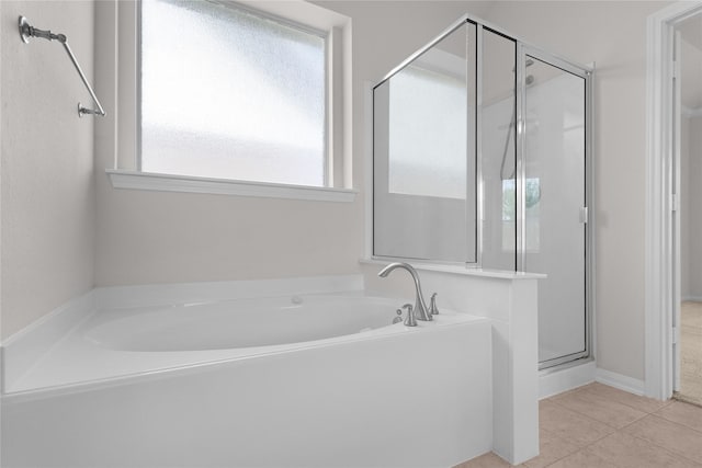 13406 Georgia Hollow Ct, Rosharon, TX 77583 - full bath featuring a stall shower, a garden tub, and tile patterned flooring