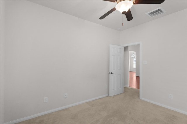 13406 Georgia Hollow Ct, Rosharon, TX 77583 - spare room with light colored carpet, a ceiling fan, and baseboards