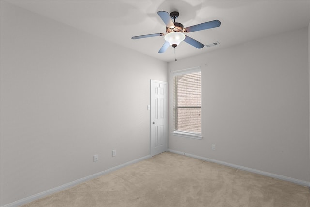 13406 Georgia Hollow Ct, Rosharon, TX 77583 - empty room with light carpet, baseboards, and ceiling fan